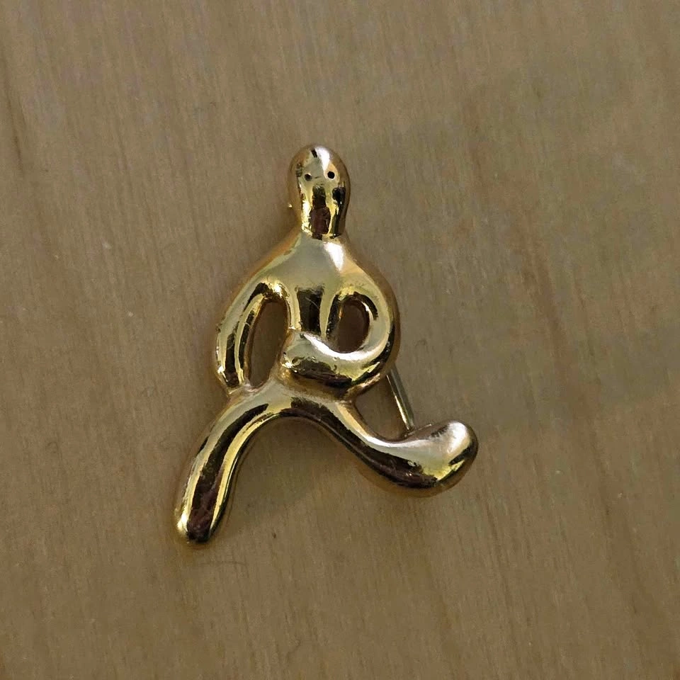 Vintage Monet Running Man Brooch Pin