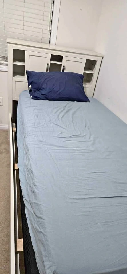 Twin bed - mattress not included
