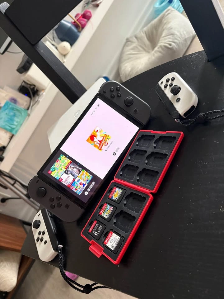 Nintendo Switch OLED and Games - photo 2