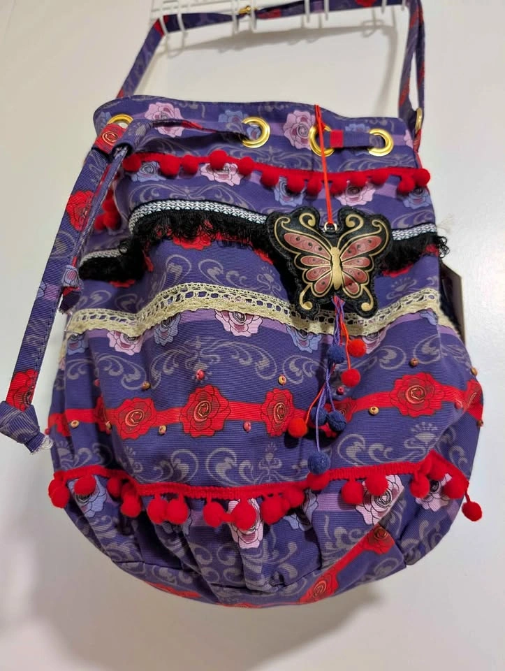 Anna Sui Drawstring Bucket Bag with Butterfly Charm