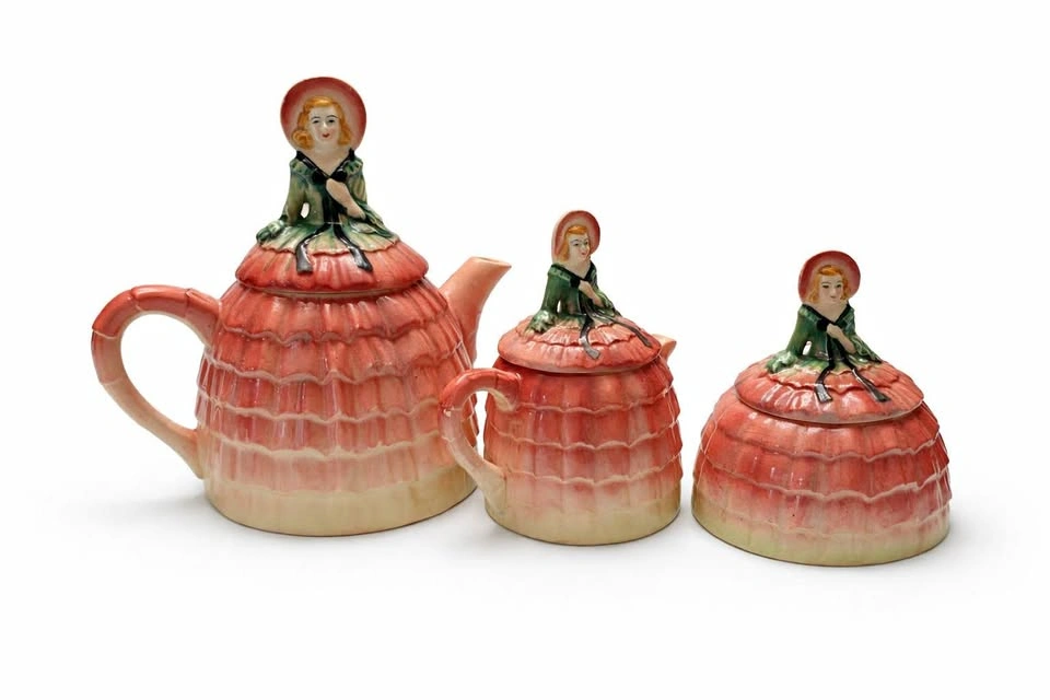 Antique Crinoline Lady Tea Pot, Creamer and Sugar bowl.