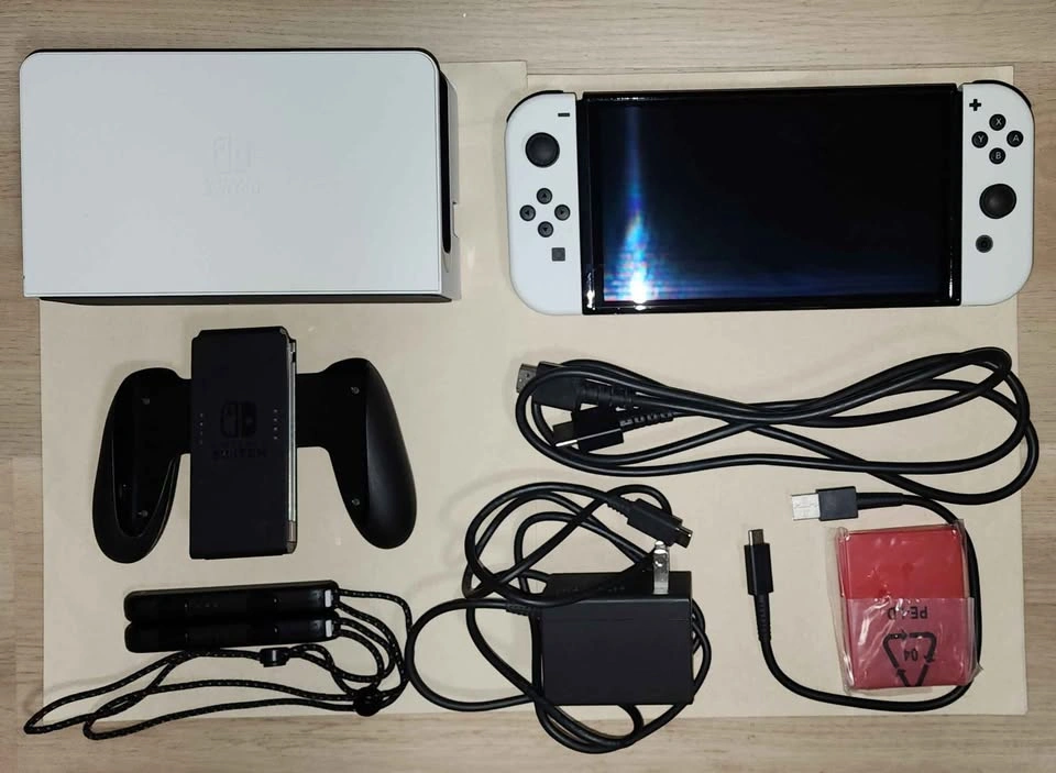 Nintendo Switch OLED Bundle w/ Case - photo 3