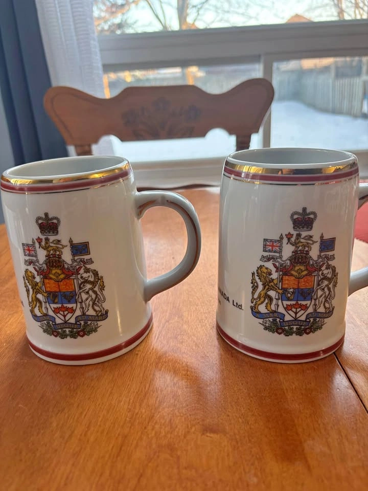 Pair of Beer/coffee mugs with Canadian Coat of arms and German C