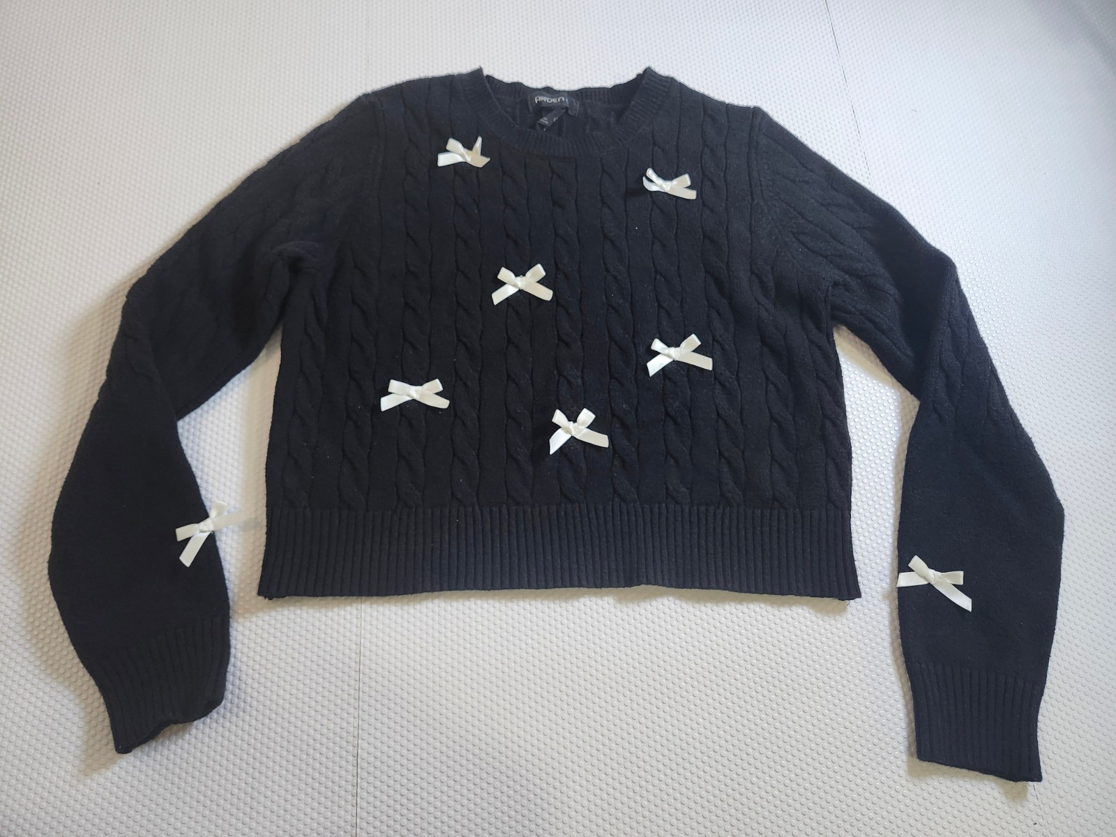 Arden Black Cable-Knit Crewneck Sweater with Cream/ White Bow Ac