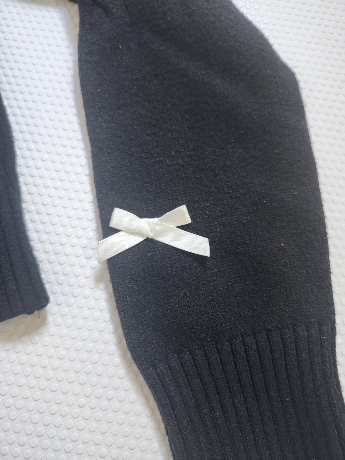 Arden Black Cable-Knit Crewneck Sweater with Cream/ White Bow Ac - photo 2
