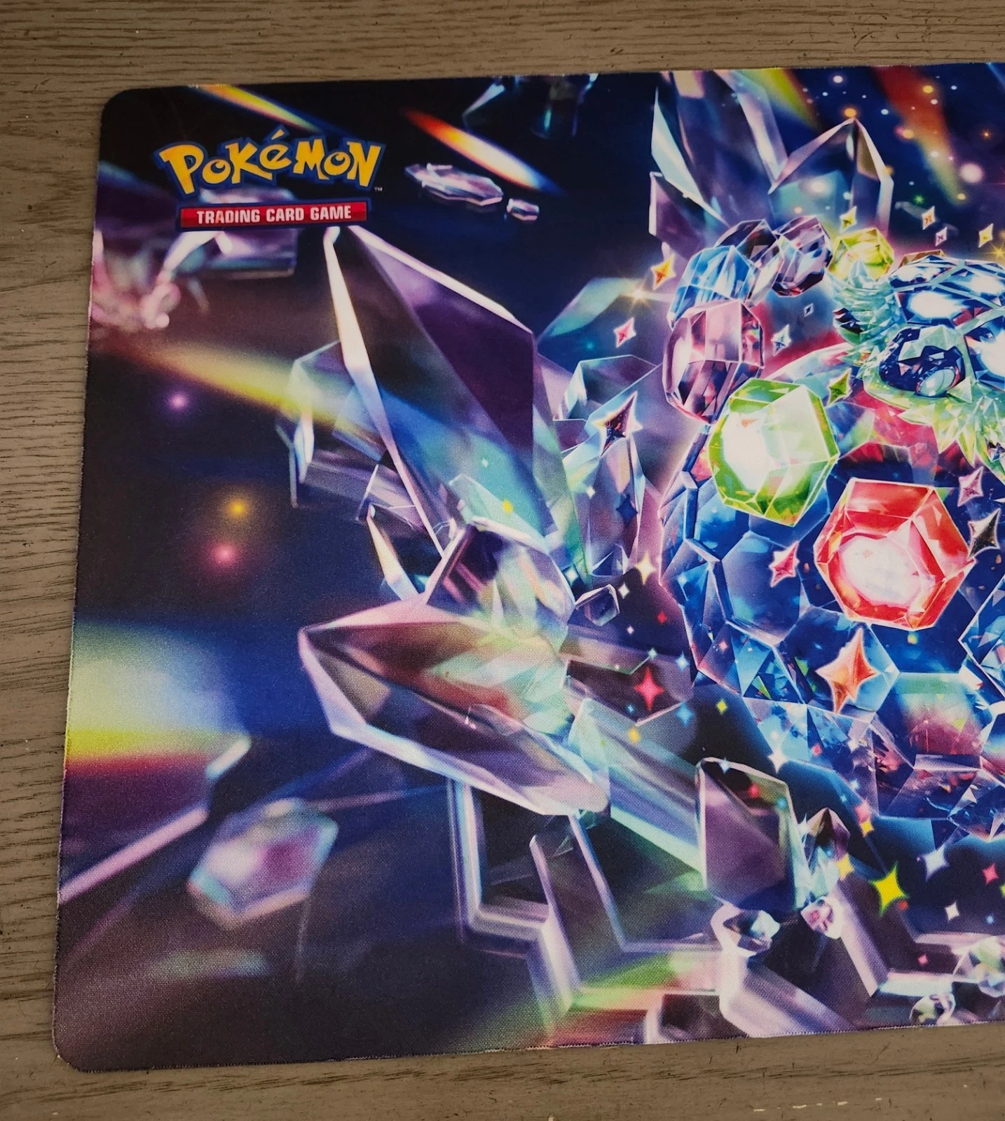 Official Pokémon-themed playmat featuring a multicolor crystal o - photo 2