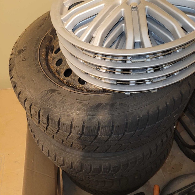 4 Starfire RS-W 5.0 Winter Tires 215 60R16 on Rims