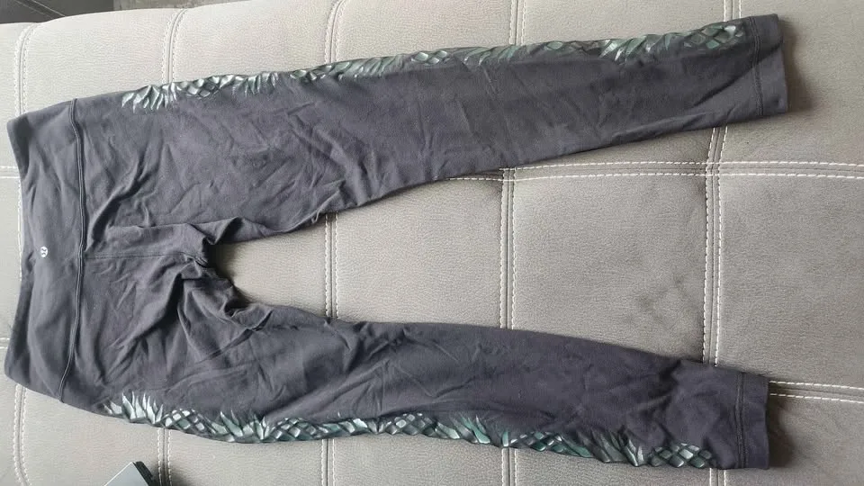 Midrise Black Lululemon Leggings (size 8) image indicator(2)