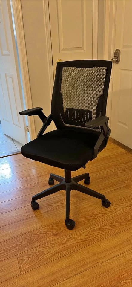Black Mesh Office Chair with Flip-Up Arms