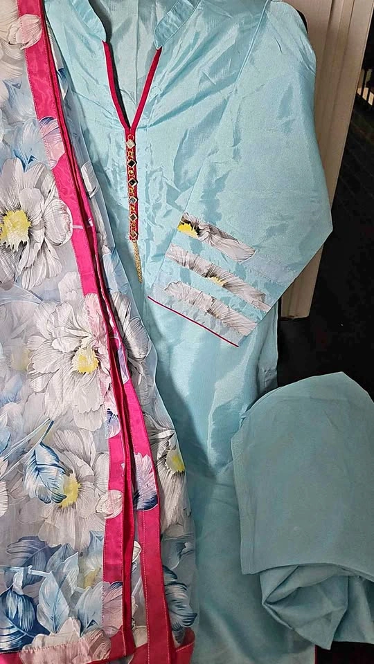 3 piece stitched silk shalwar suit with printed organza dupatta.