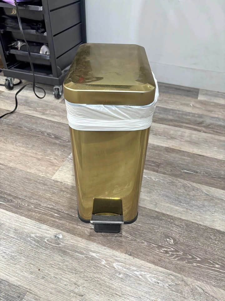 Gold garbage bin