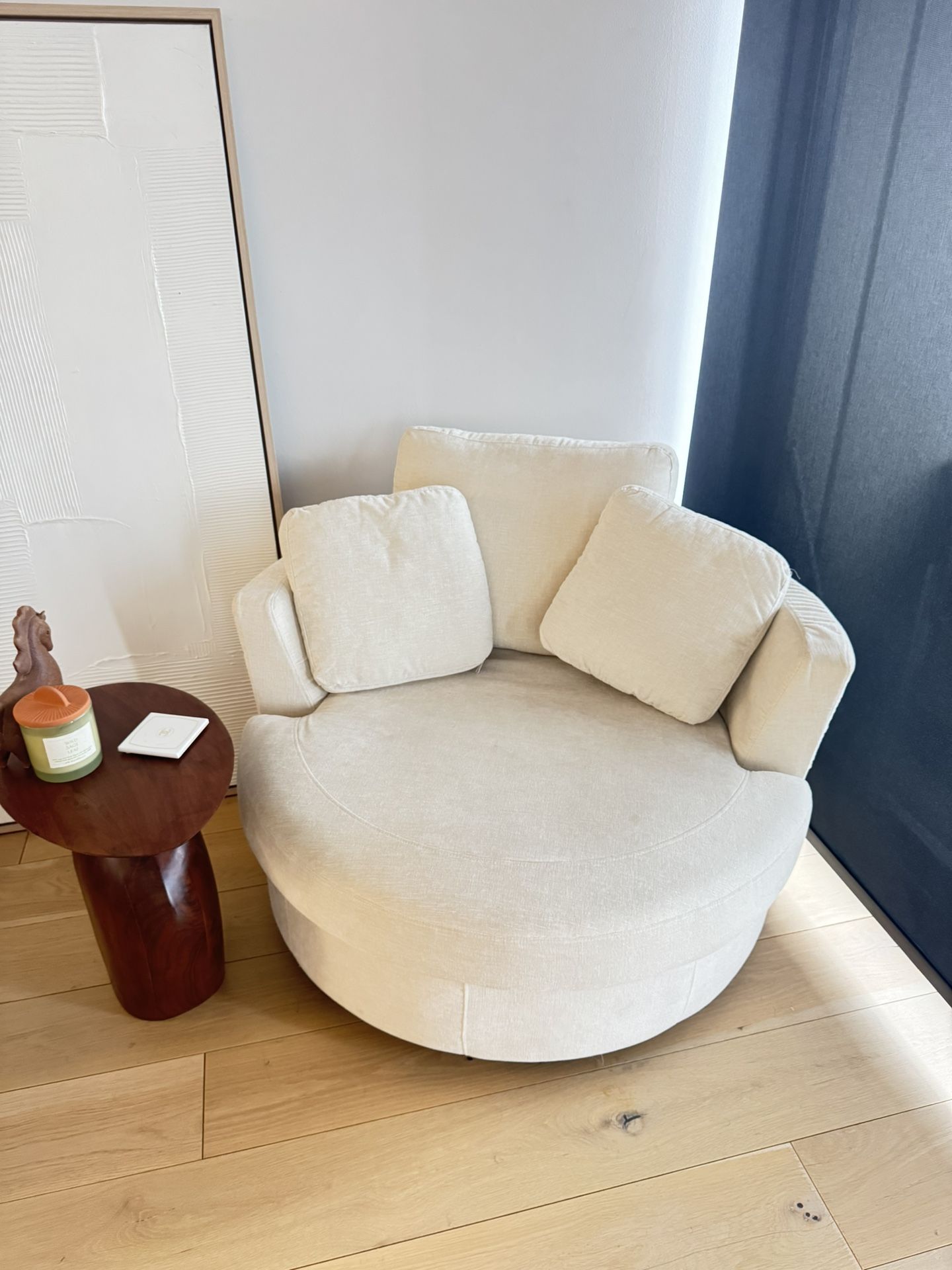 $300 Beige Swivel Chair