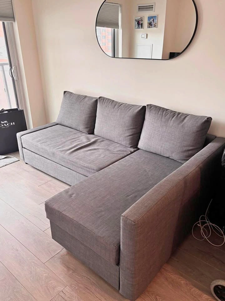 Corner sofa-bed with storage, Skiftebo dark gray FRIHETEN