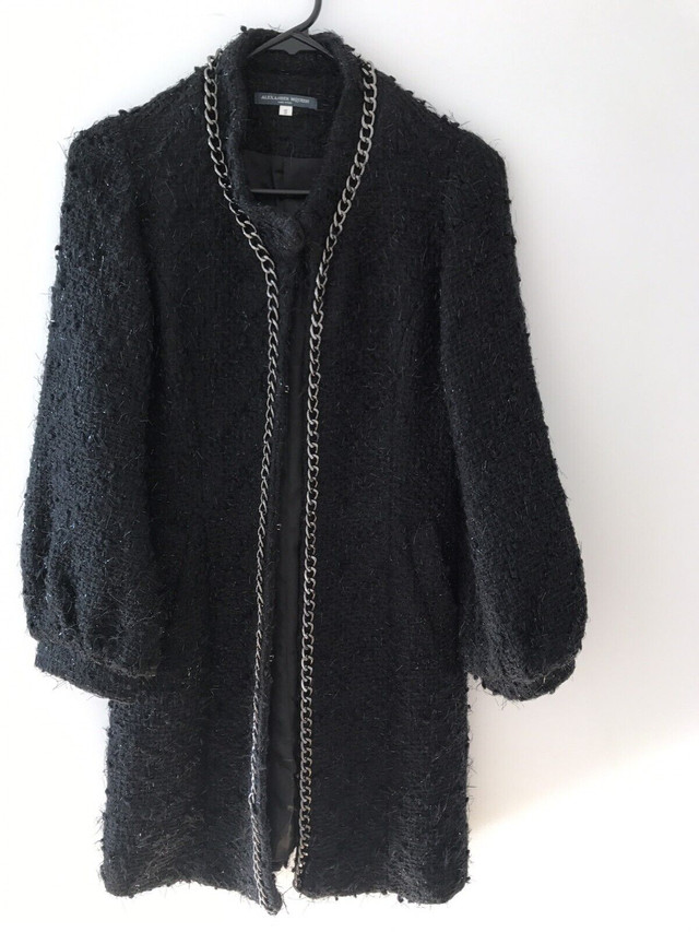 Alexander McQueen black coat with long golden chain