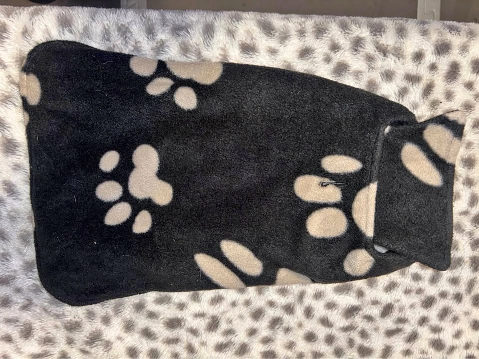 Small fuzzy dog jacket with paw print
