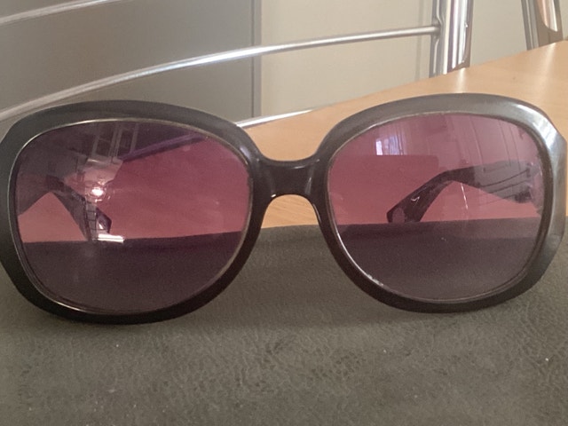 Michael Kors used sunglasses