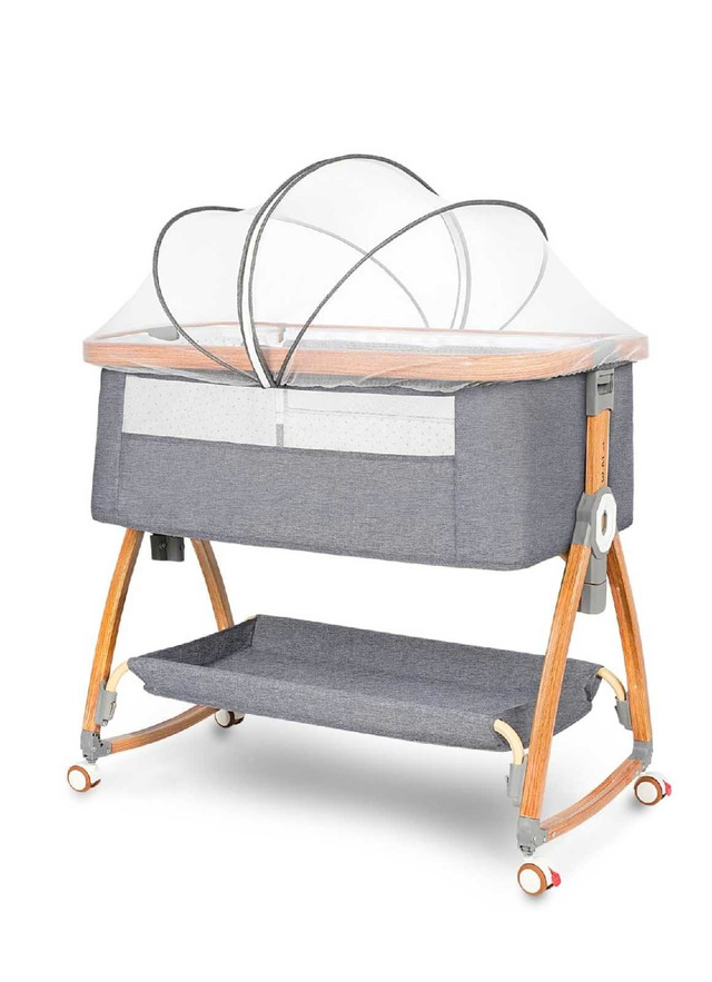 Bed side Bassinet (Like new)