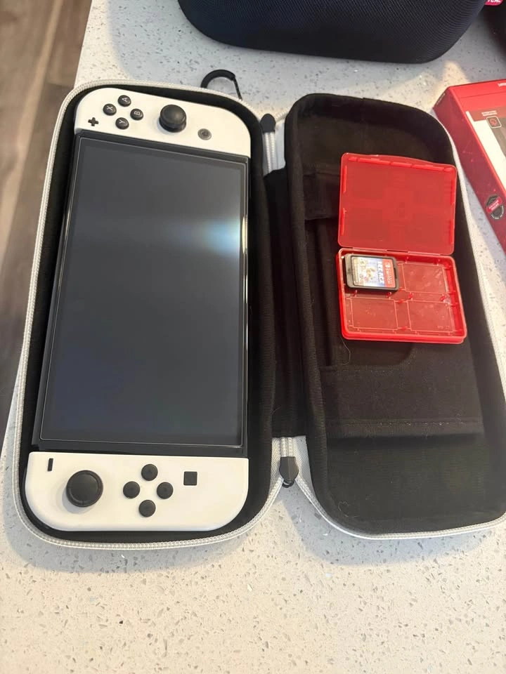 Nintendo Switch OLED White Bundle - photo 2