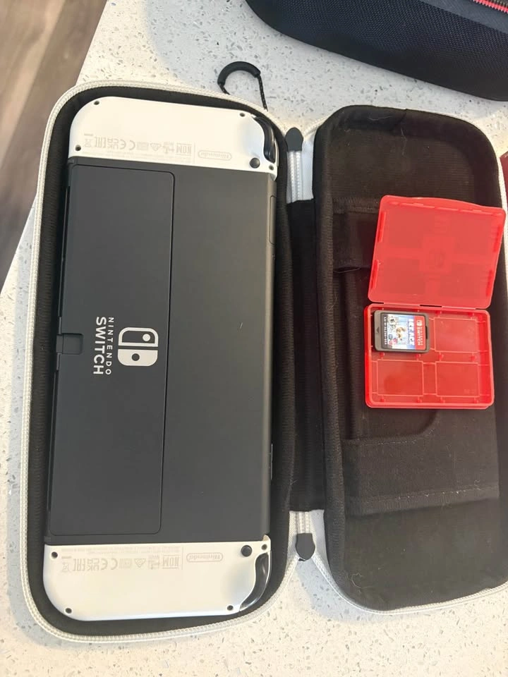 Nintendo Switch OLED White Bundle - photo 3