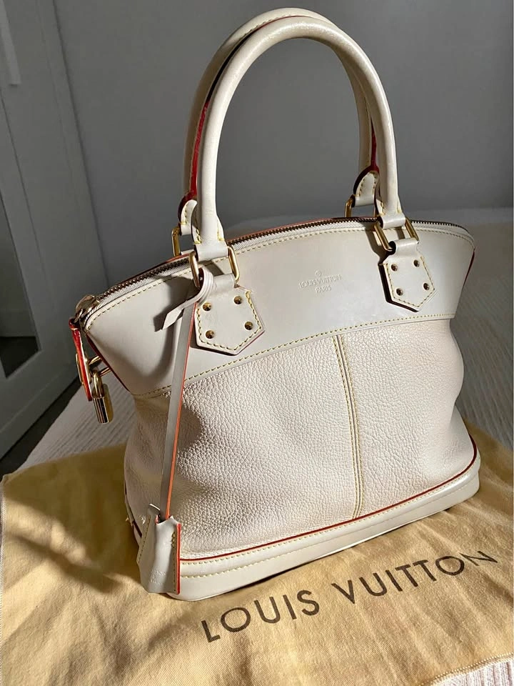 Authentic Louis Vuitton Ivory Suhali Leather Lockit MM
