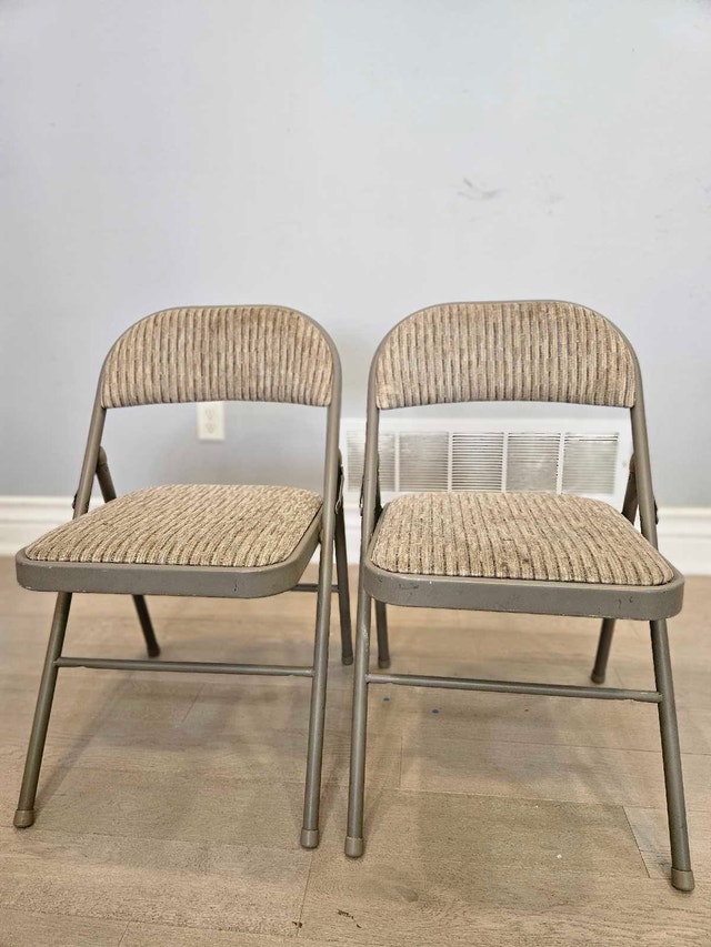 2 Folding Chairs (Padded Fabric) – $20 for Both