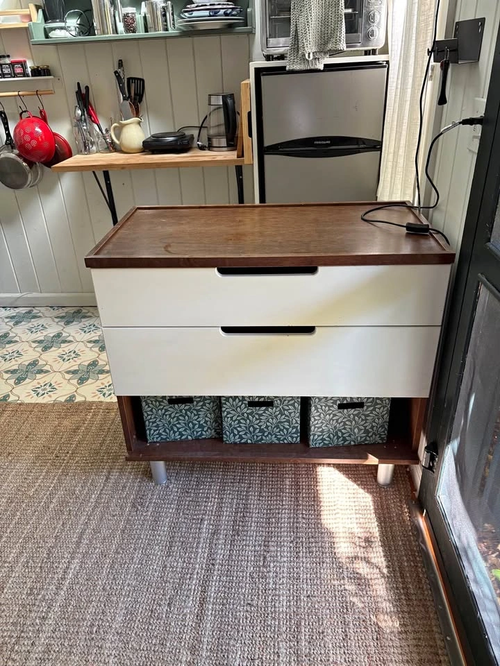 Oeuf dresser with changing pad topper, two drawers and bottom sh