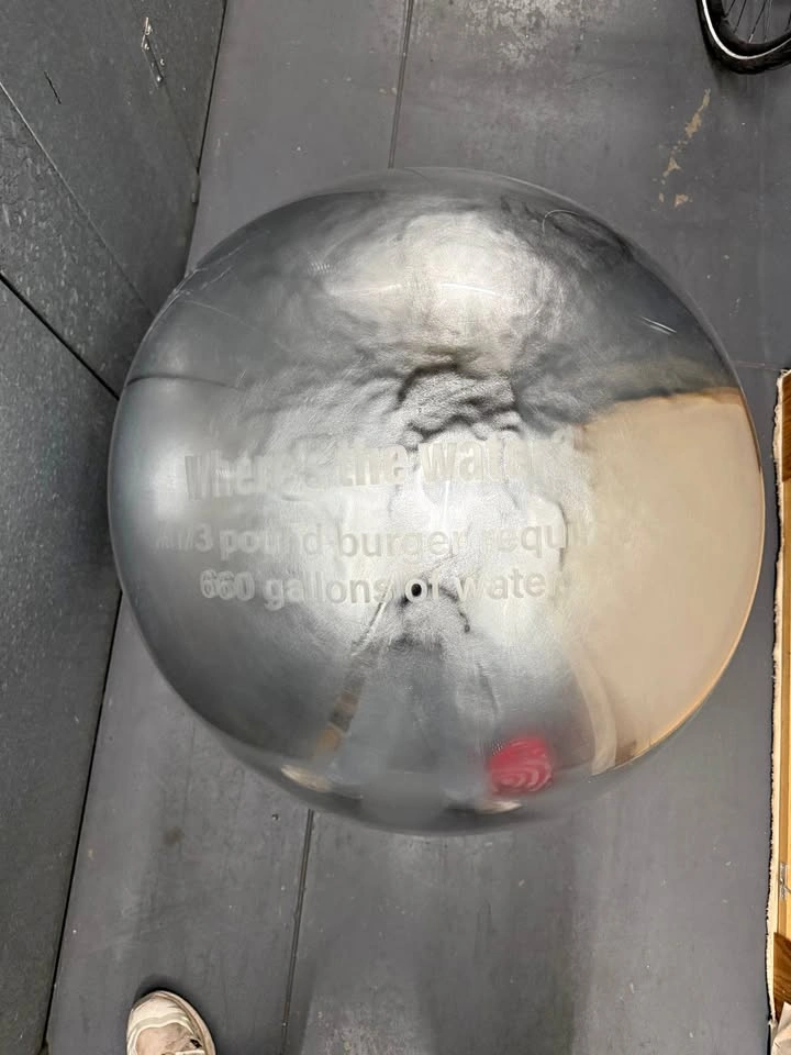 Iridescent silver glob.