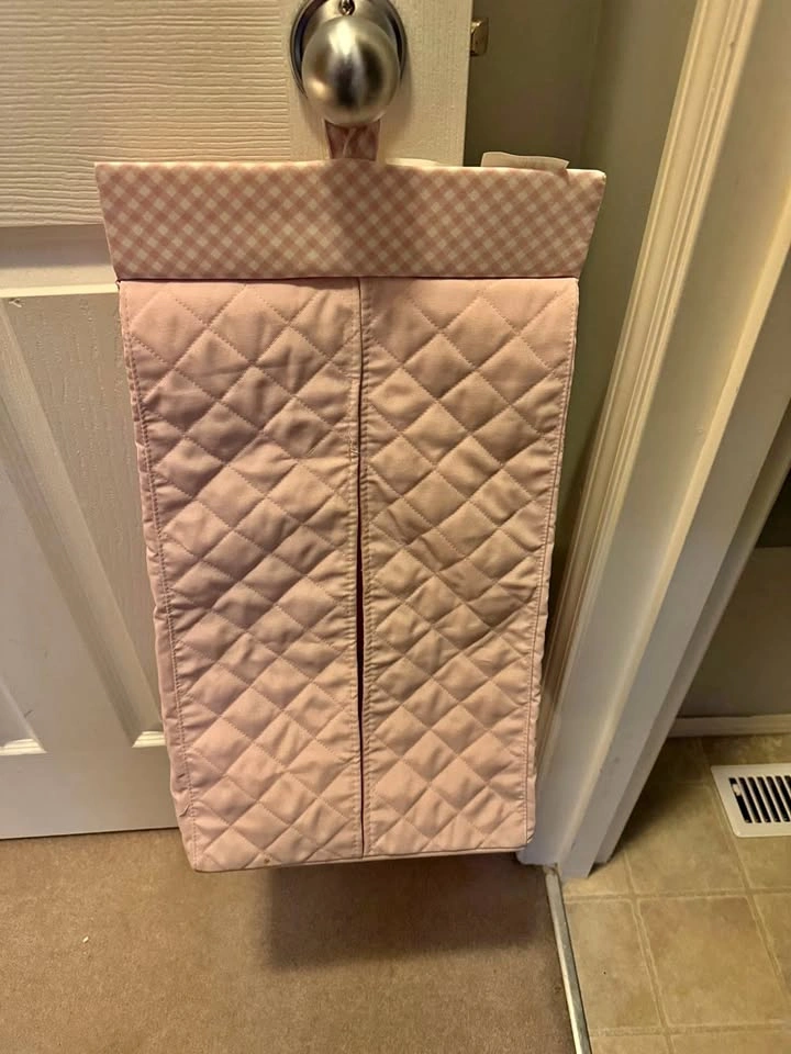Diaper holder for door