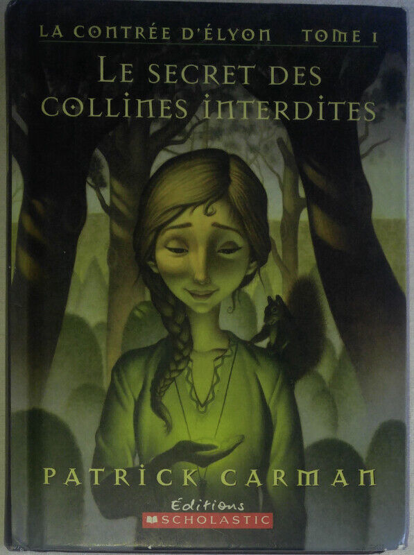 Scholastic Le Secret Des Collines Interdite Livre - French Book
