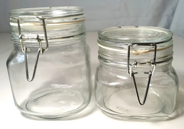 Two clear glass jars with hinged metal clasps image indicator(2)