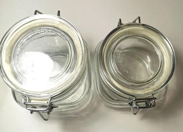 Two clear glass jars with hinged metal clasps image indicator(3)