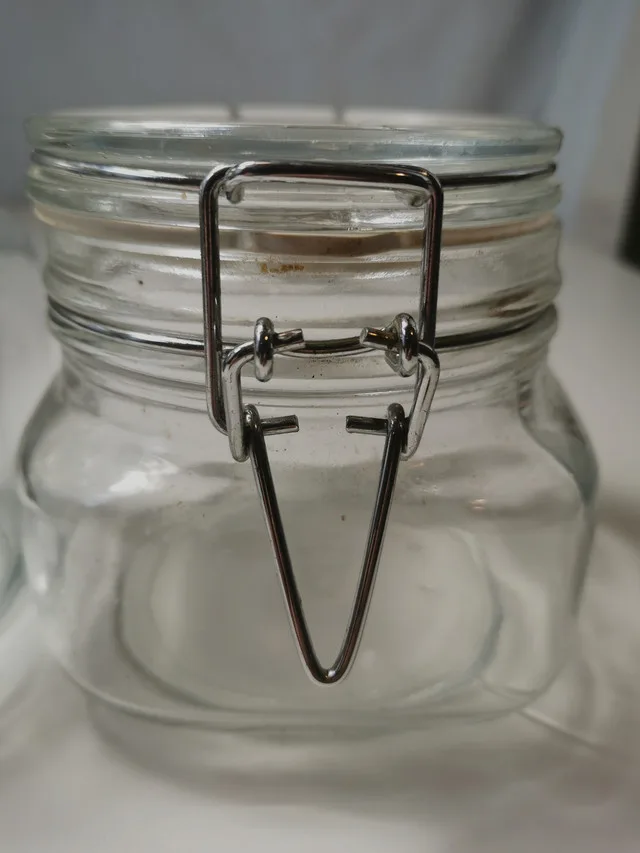Two clear glass jars with hinged metal clasps image indicator(4)