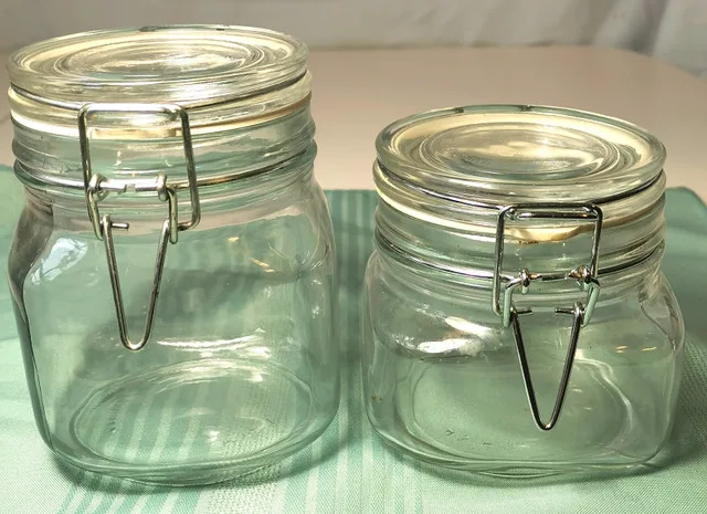 Two clear glass jars with hinged metal clasps image indicator(7)