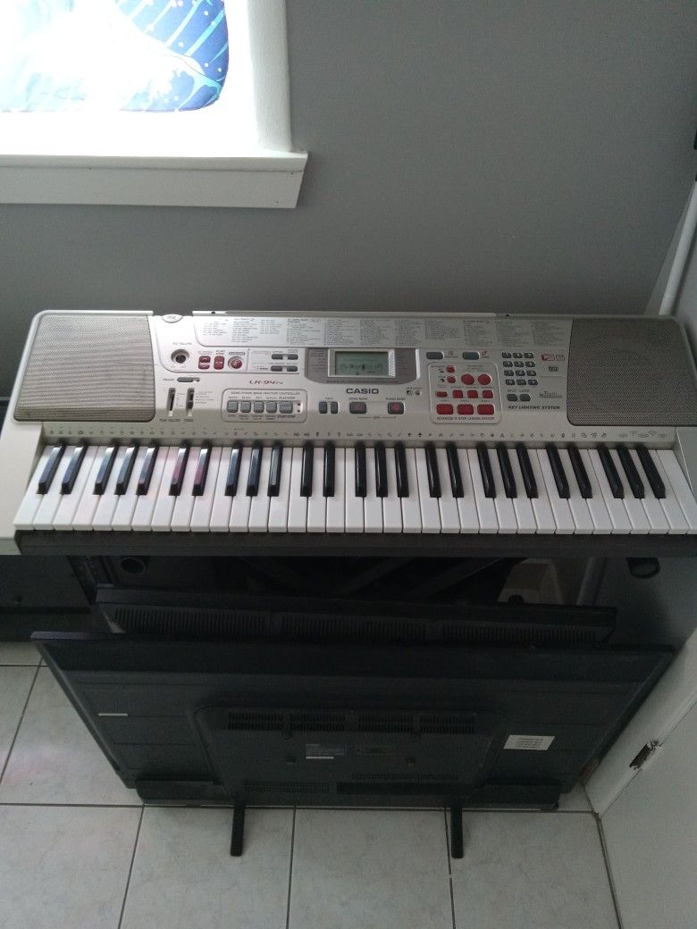 Casio Electric Keyboard With Stand