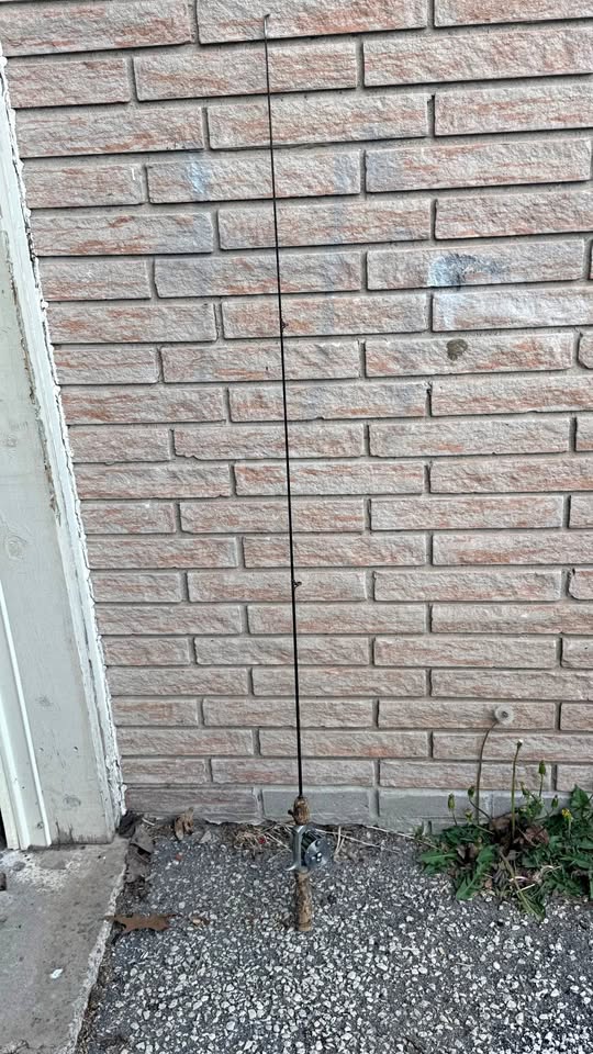 Metal Fishing pole with 1960 Shakespeare Criterion HD reel