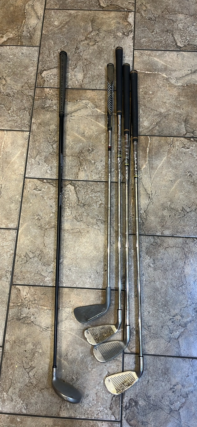 Mismatched irons and gold club - photo 2