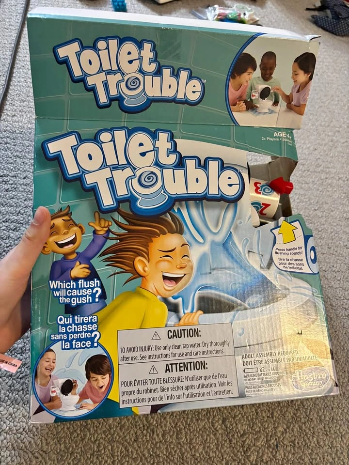 Toilet trouble board game