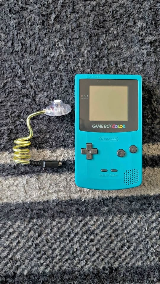 Game Boy Color plus Worm Light