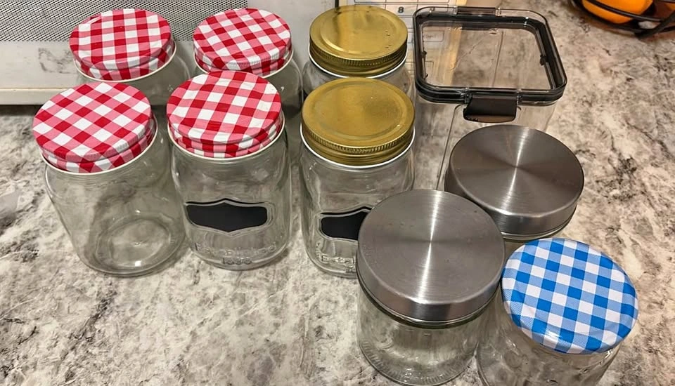 Assorted glass storage jars and canisters