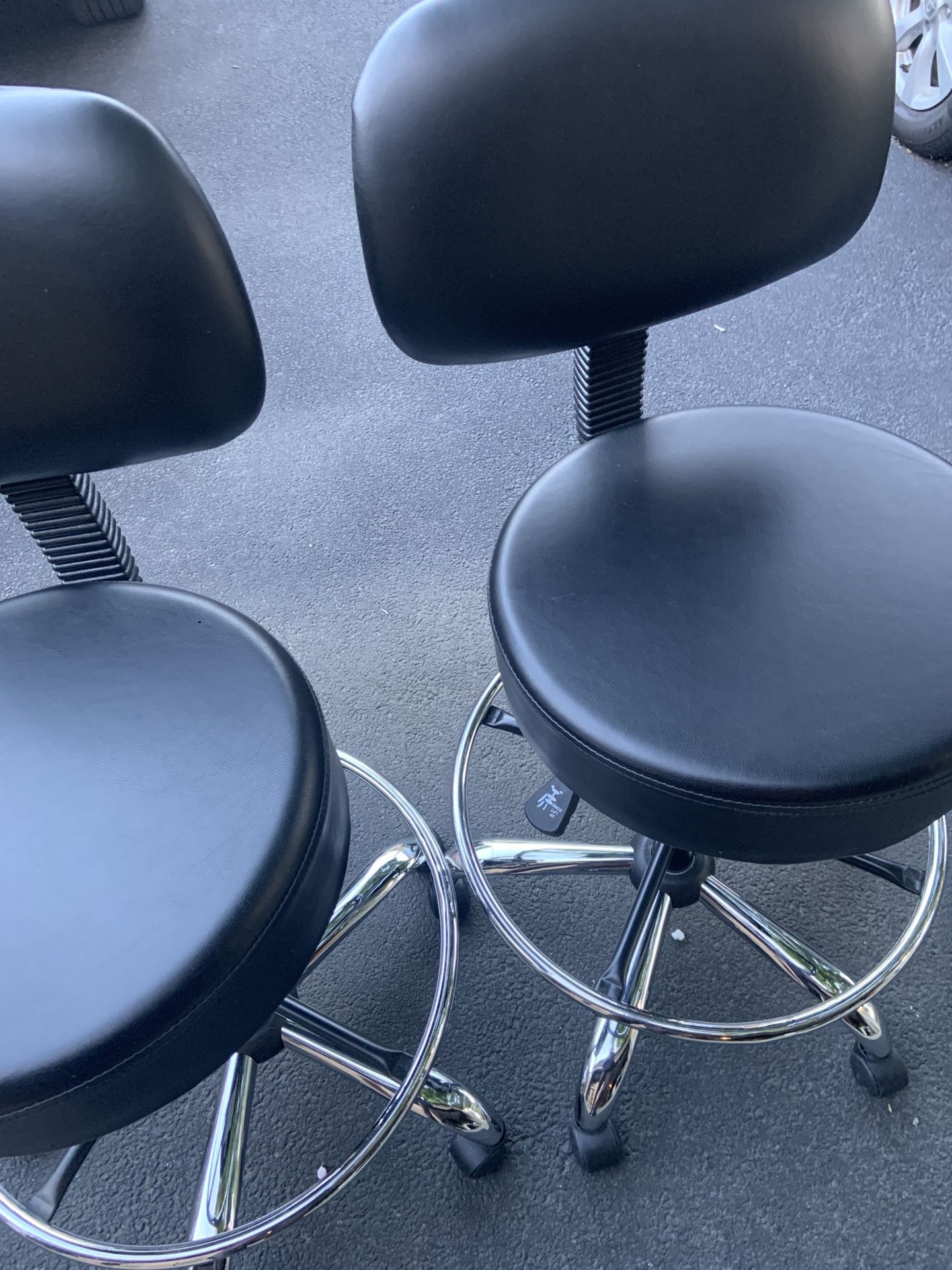 Two Black Swivel Chairs
