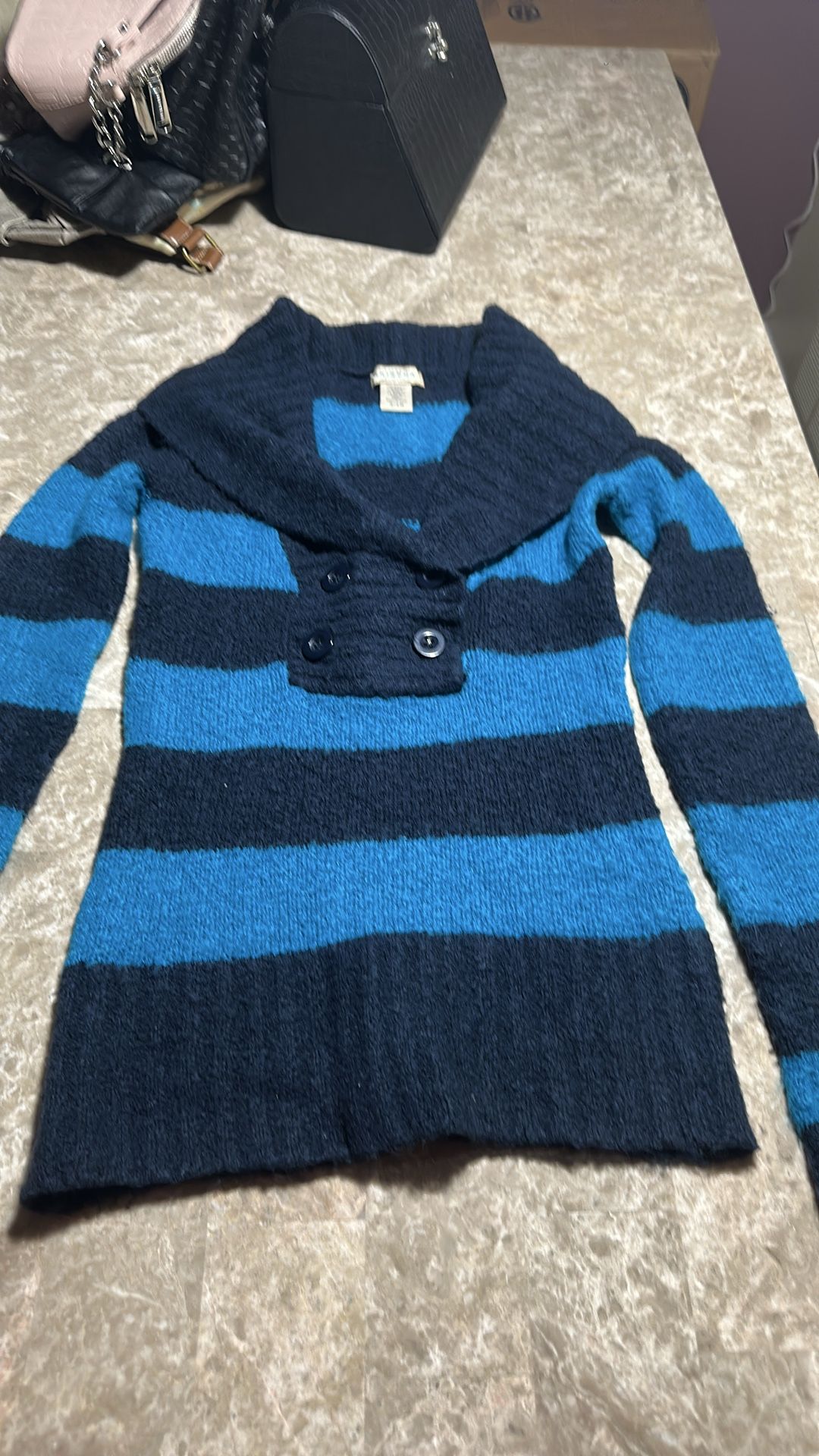 Lightly used blue striped long sleeve warm sweater
