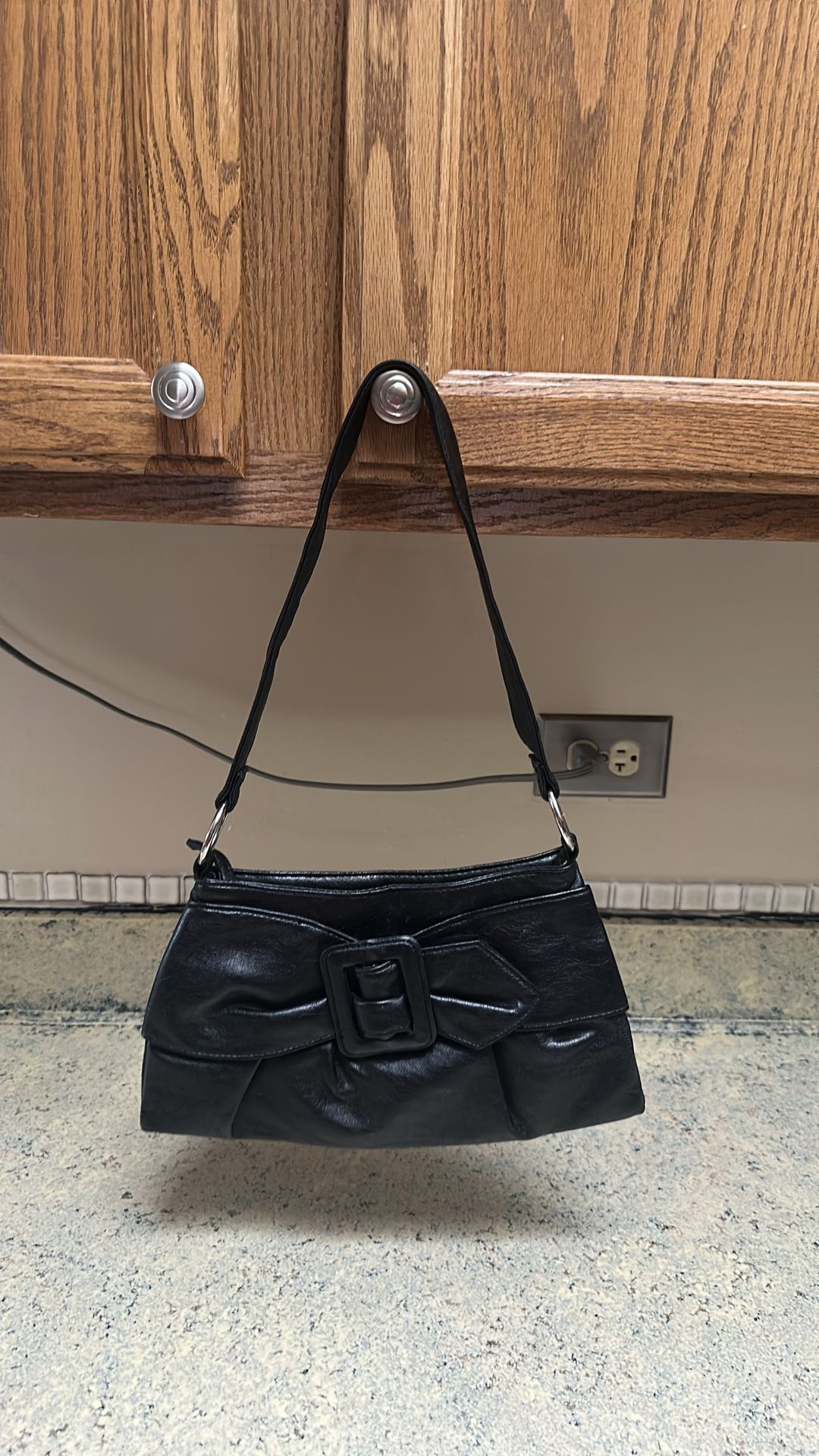 Black lightly used shoulder strap purse with bow tie design - photo 2