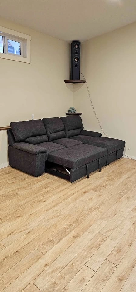 Leons Pull Out Sectional - Retail: $2000