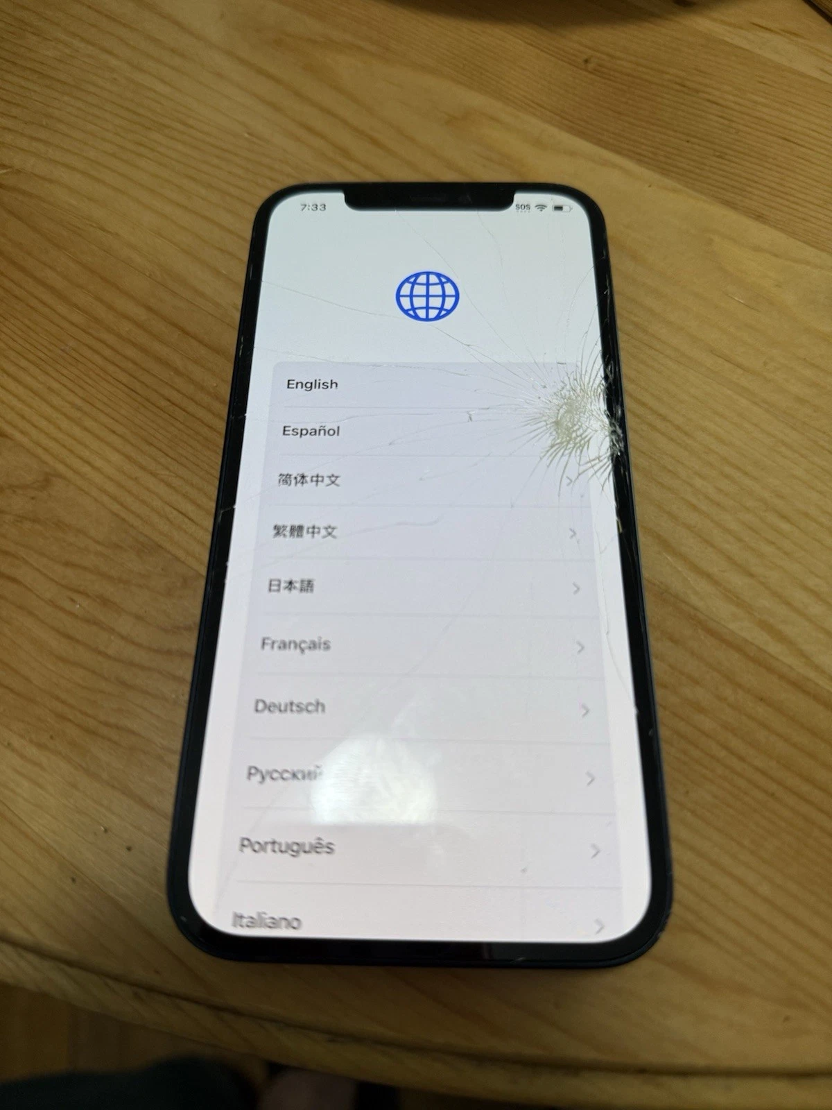 iPhone 12 Locked to Owner - Cracked Screen