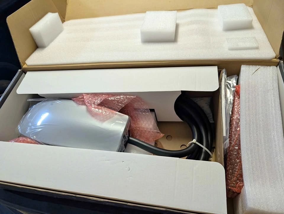 Brand new Tesla Wall Charger, still in original packaging. Never