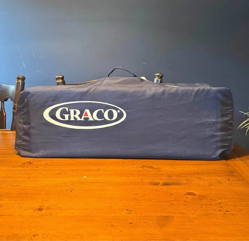 Graco Pack n Play - Blue w checkered pattern