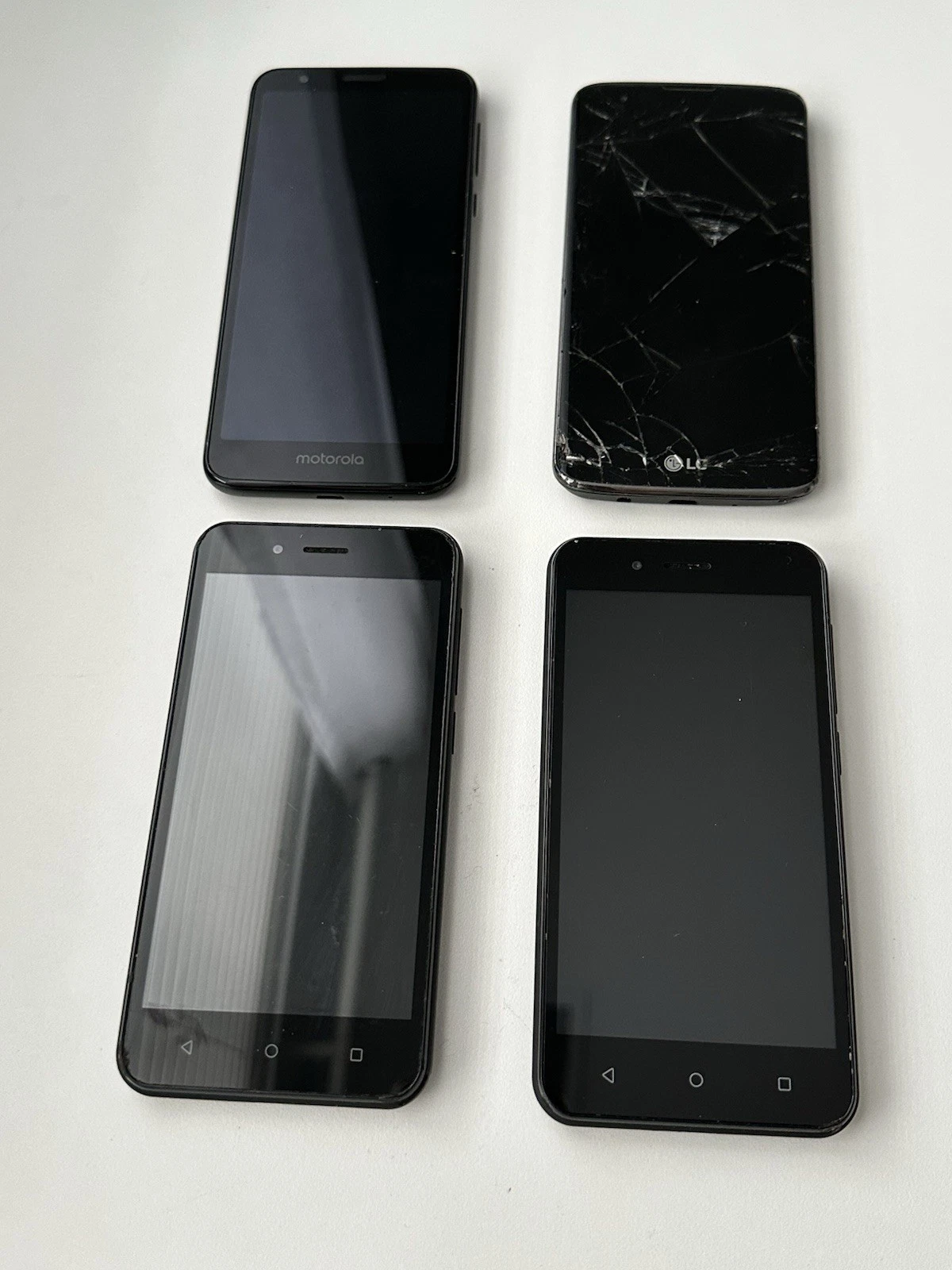 Lot 4 Android Phones Motorola LG UMX Parts Repair Cracked Untest