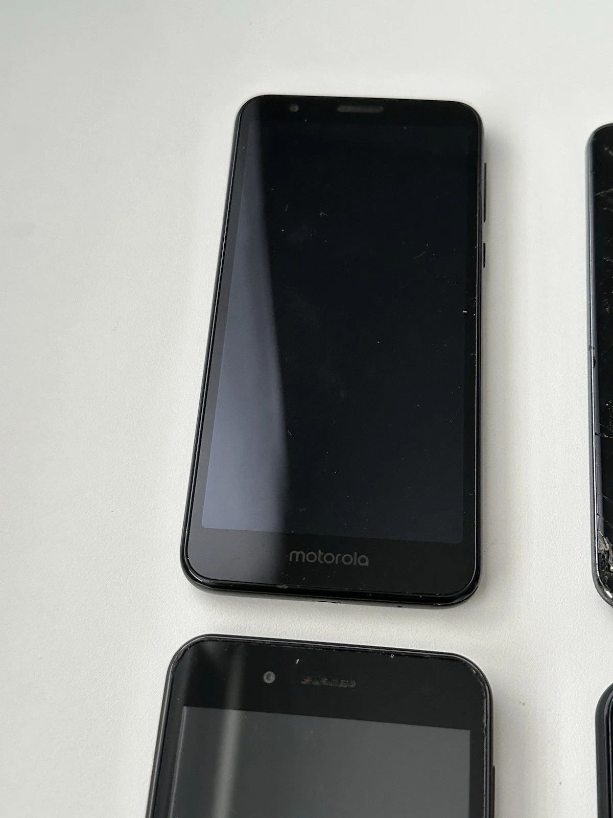 Lot 4 Android Phones Motorola LG UMX Parts Repair Cracked Untest - photo 3