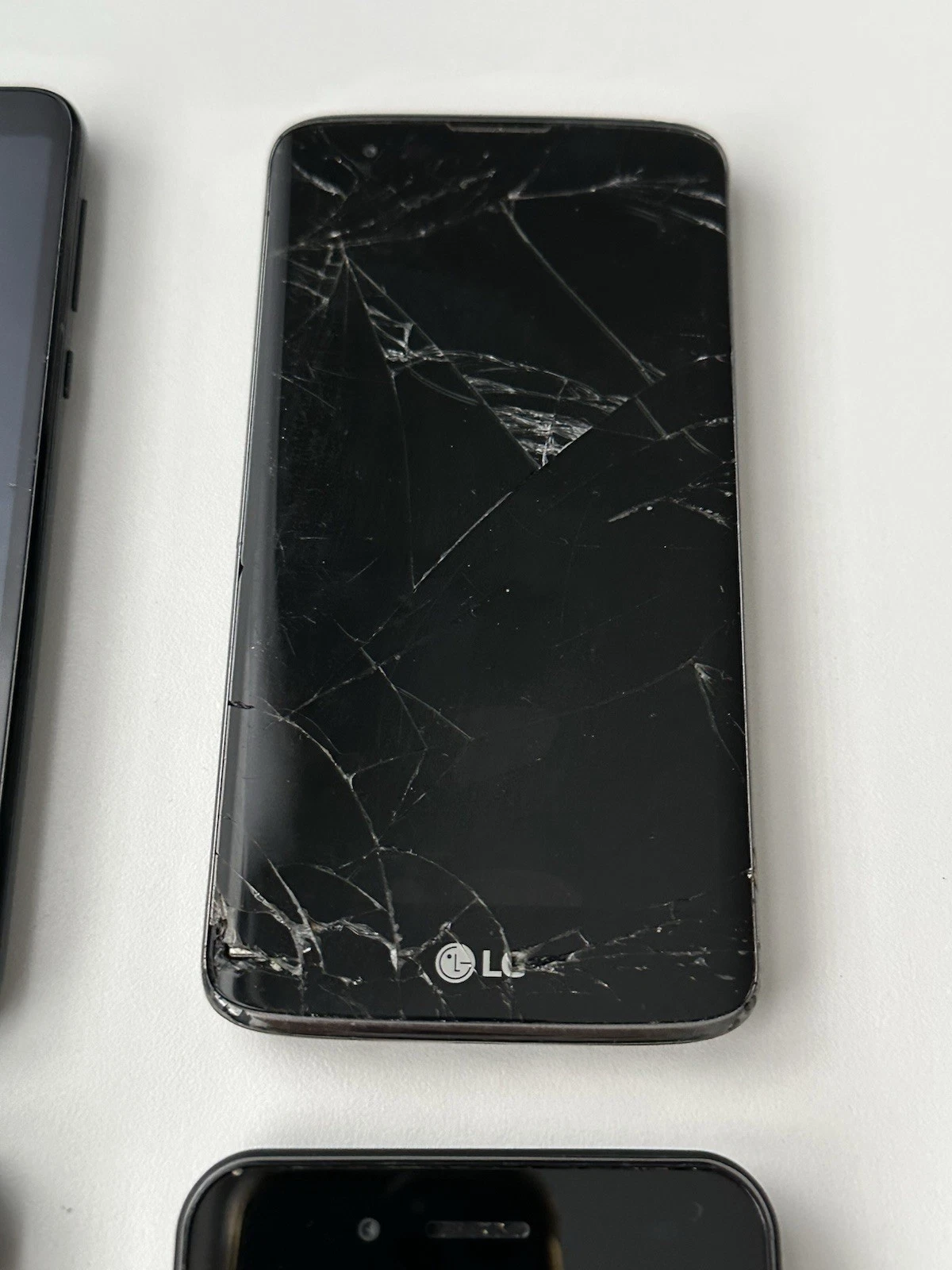 Lot 4 Android Phones Motorola LG UMX Parts Repair Cracked Untest - photo 4