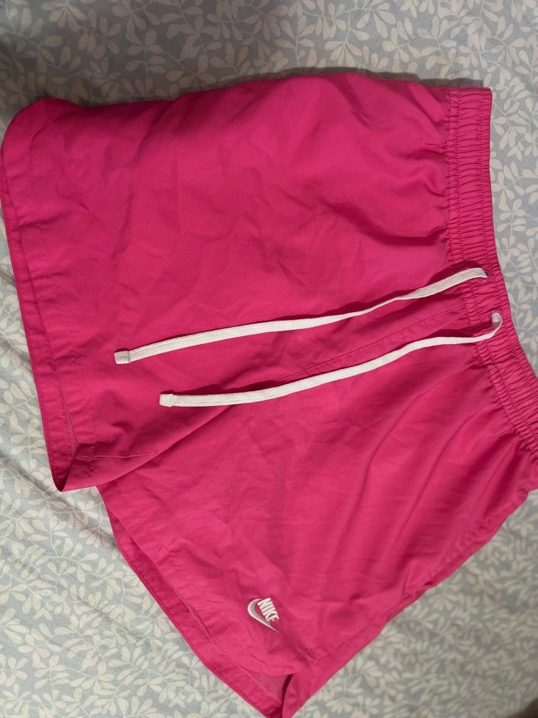 Nike pink colour shorts size M